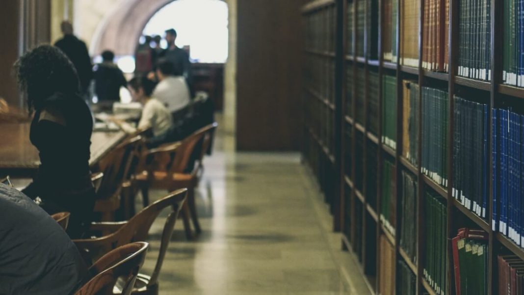 students at wooden old library