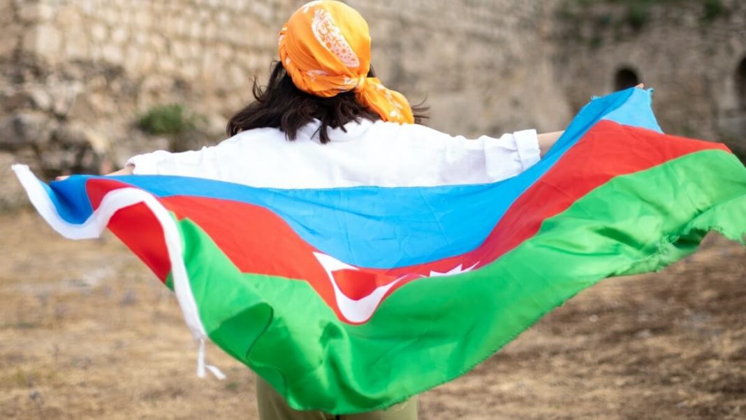 girl holding belarus flag waving