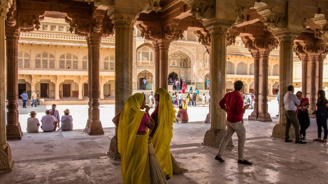 people tourists in old brown temple