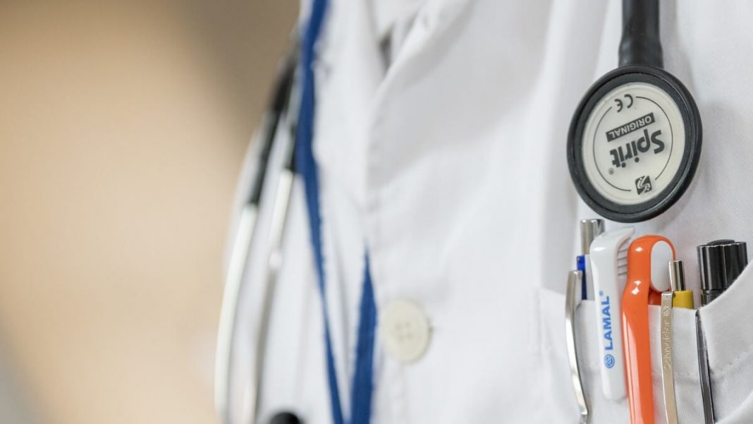 doctor scrub with pens and stethoscope