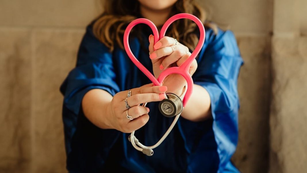 nurse with heart-shaped stethoscope