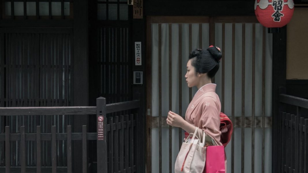 japanese woman wearing pink kimono