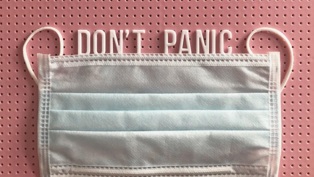 don't panic white plastic letters pandemic mask