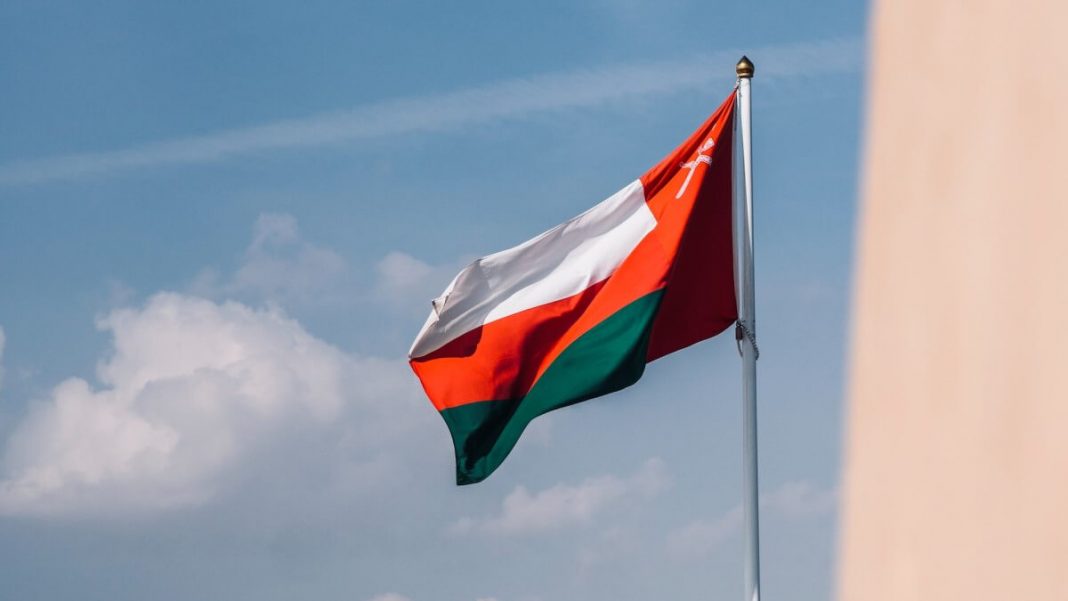 oman flag on flagpole waving