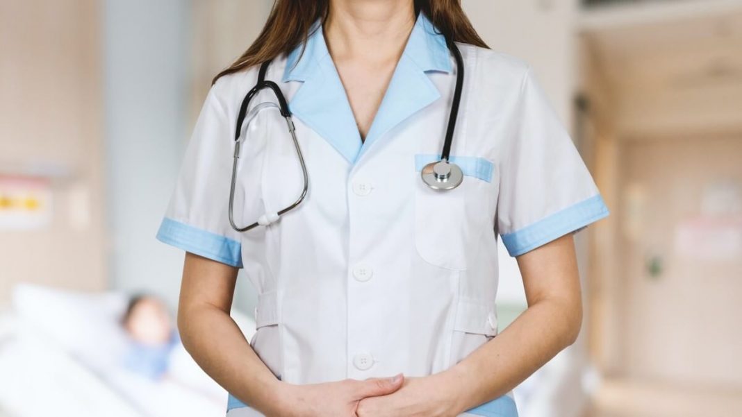 nurse holding medical stethoscope