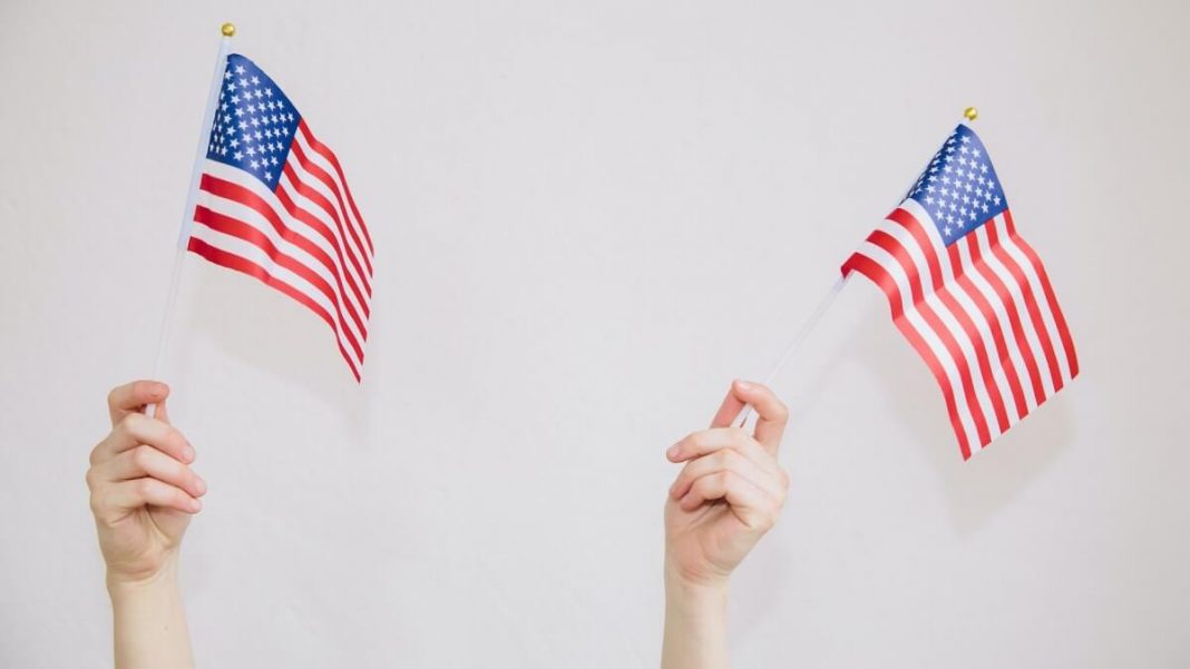 people holding us flags