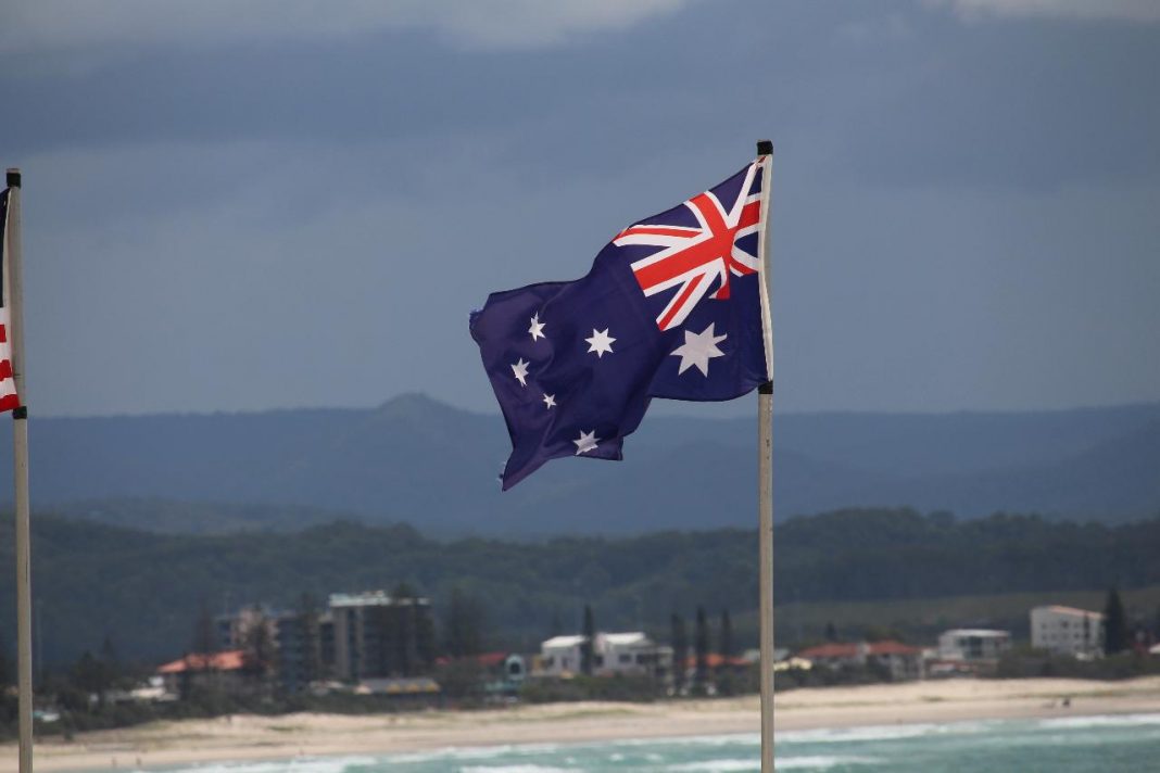 australian flag waving at the seaside