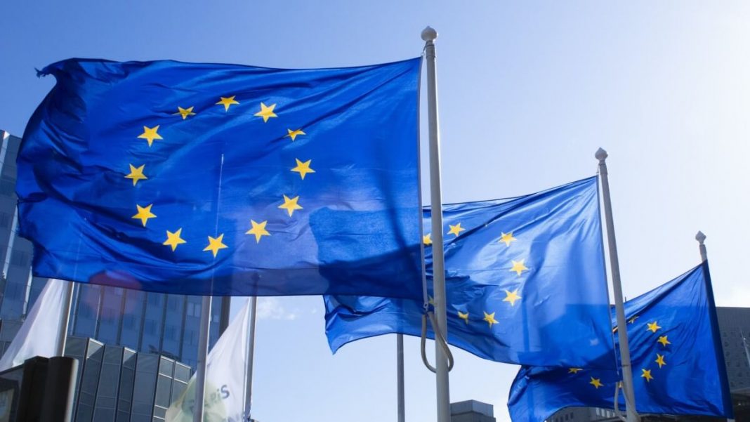 eu flags waving next to la defense paris