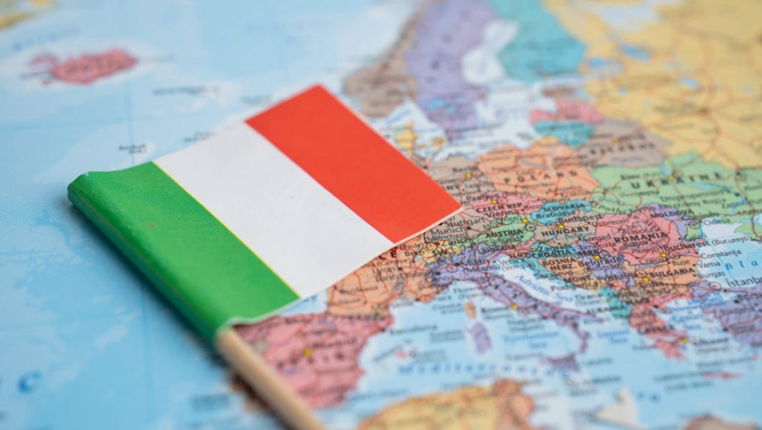Italy flag on world map background