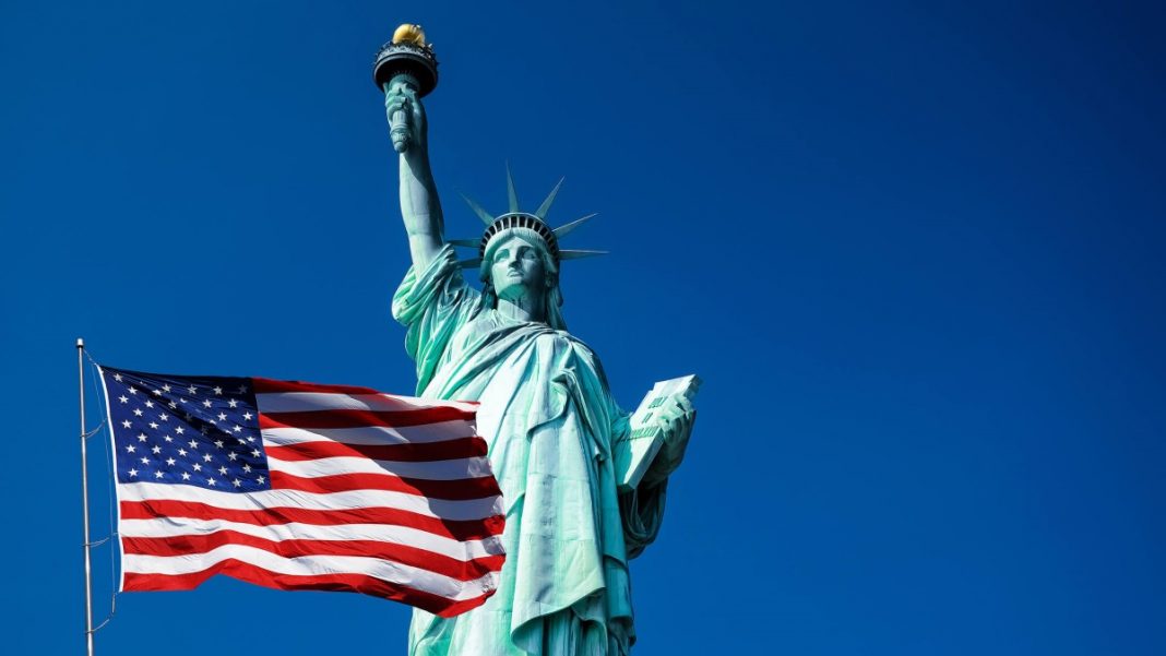 us flag and statue of liberty