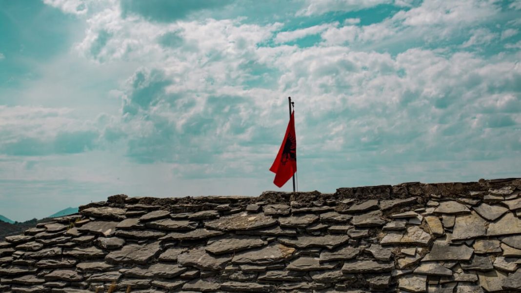 albanian flag hanging on roof