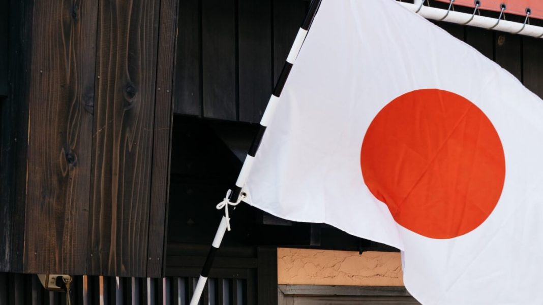japan flag on black and white flagpole