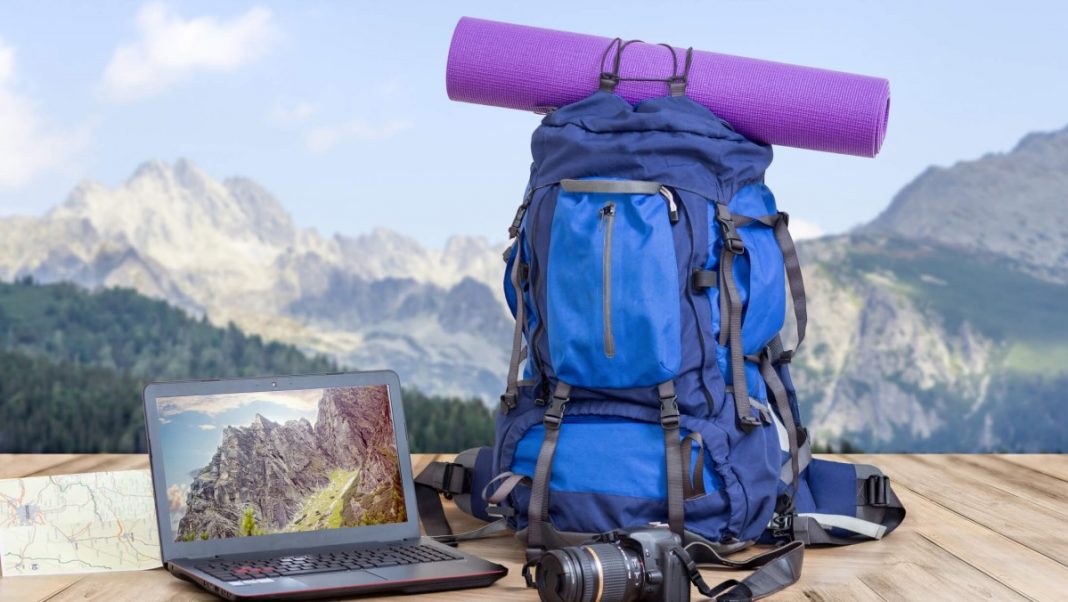 backpacker travelling across mountains