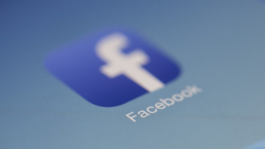 facebook blue app icon on phone screen