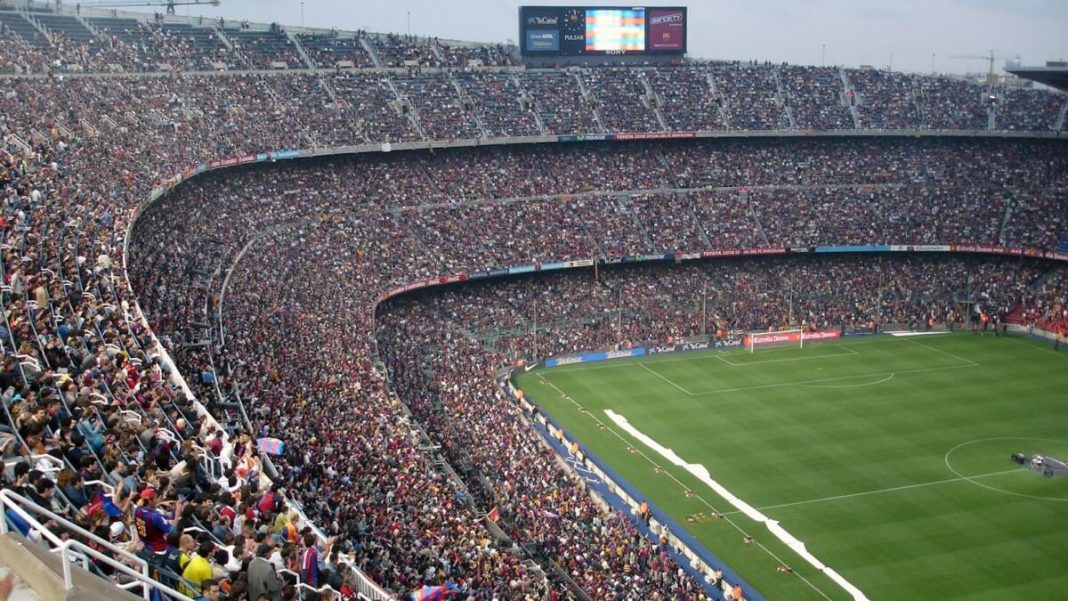 soccer stadium football match with people watching