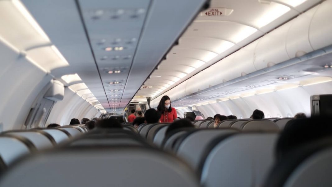 airplane seats flight attendants and travelers
