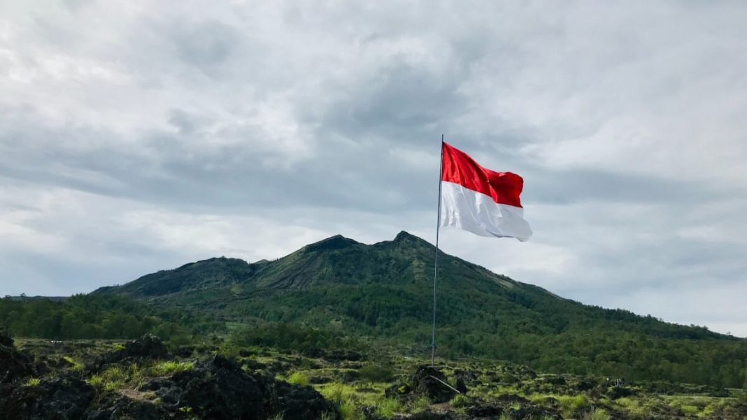 indonesia flag waving mountain view