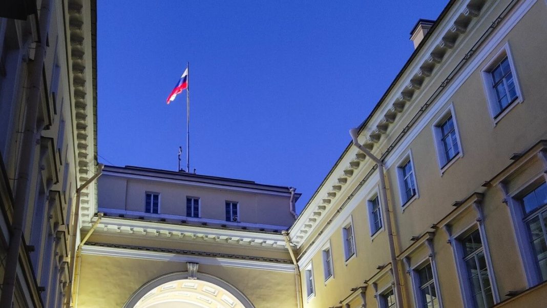 russia flag waving up in senate and synod building st petersburg