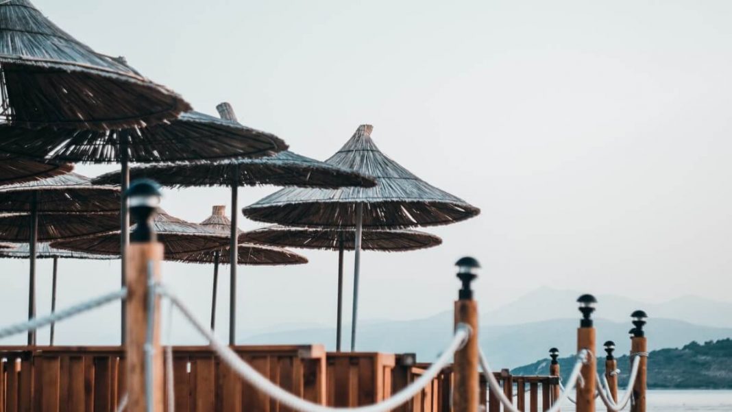 beach parasols in ksamil beach albania