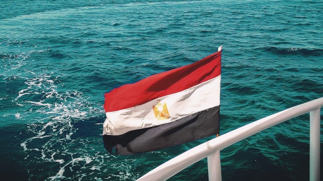 egypt flag waving sea background