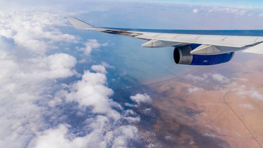 white blue airplane wing view