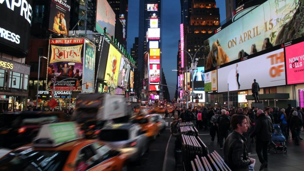 traffic and groups of people times square new york