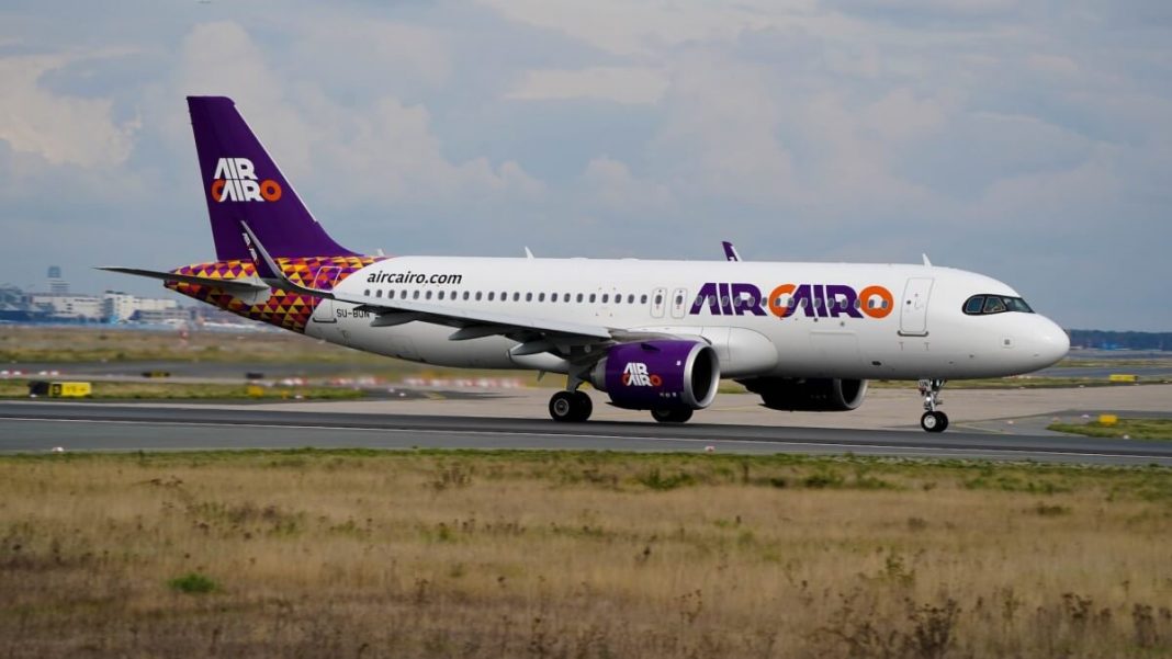 air cairo airplane in airport runway