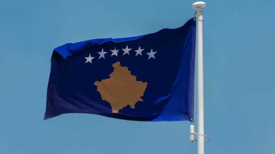 kosovo flag on flagpole waving