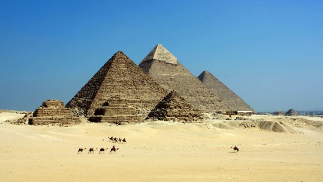 pyramids egypt desert blue sky
