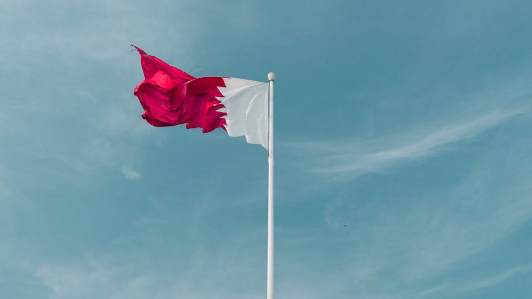 qatar flag waving up in wind