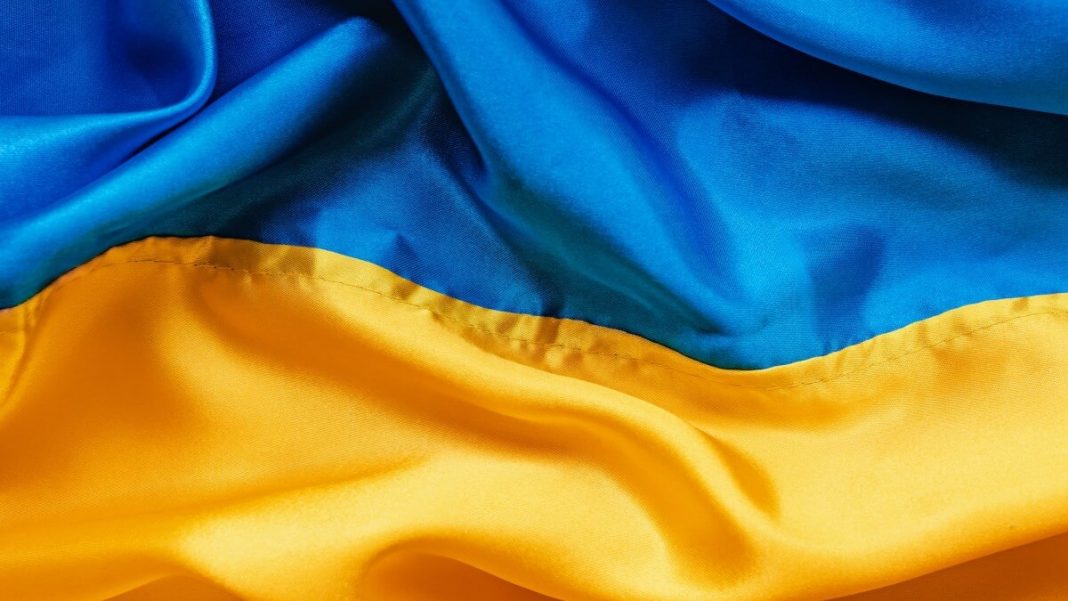 ukraine flag close up yellow blue fabric