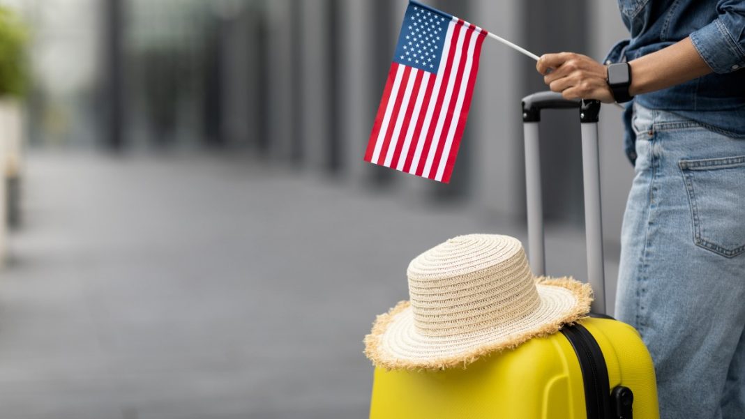 Woman holding American flag, Travel
