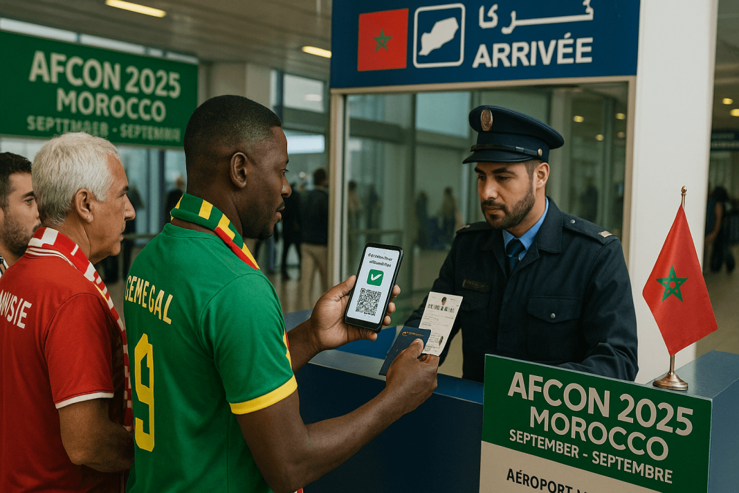 Moroccan border officer at Casablanca Mohammed V Airport checks a fan’s smartphone showing an AFCON 2025 electronic travel authorization, with supporters in Tunisia and Senegal jerseys waiting in line beside event signage.